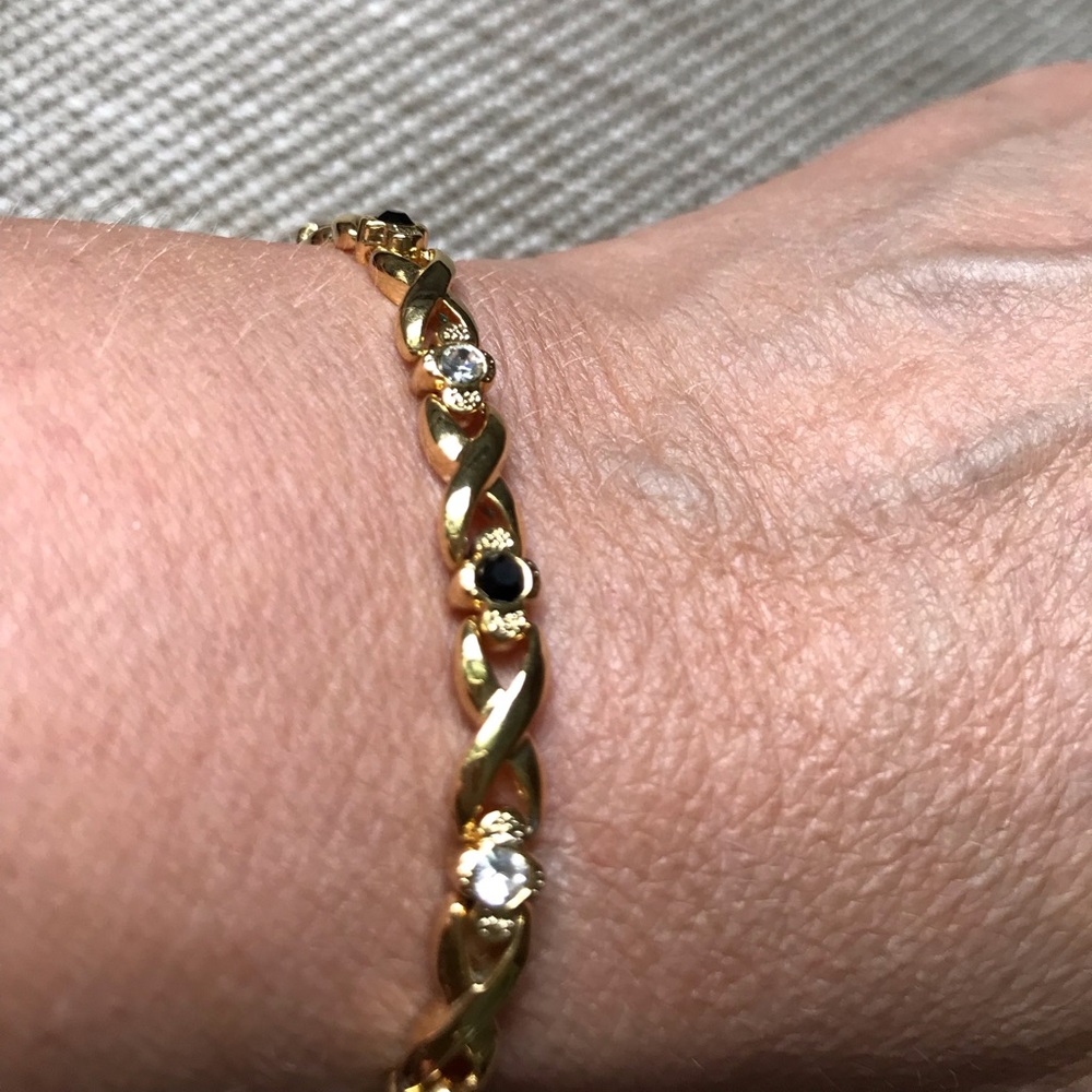 Bundle 3 for $10 Gold toned bracelet with black and diamond colored accents EUC